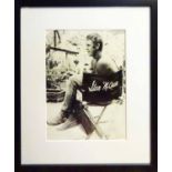 'STEVE McQUEEN smoking a cigarette on set', b/w photograph, limited edition 4/300,