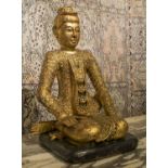 BUDDHA, Eastern carved giltwood and bejewelled, seated figure on black base, 52cm H x 33cm W.