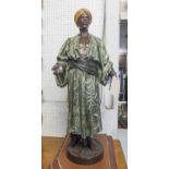 BLACKAMOOR FIGURE, in a green robe, 95cm H.