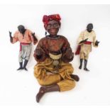 BLACKAMOOR DOLLS, a pair, each 33cm H and a seated doll, 40cm H.