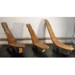 DAGALO ZOBU TRIBAL SEATS, a pair, plus an additional similar seat, tallest 51cm H.