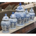 URNS, a series of five, ginger jar vase form Chinese blue and white ceramic with lids,