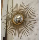 STARBURST CONVEX WALL MIRROR, gilt metal frame signed 'Chaty Vallauris Am', 71cm diam.