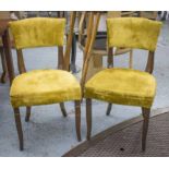 DINING CHAIRS, a set of ten, Art Deco style with gilt detail and yellow velvet cord upholstery.