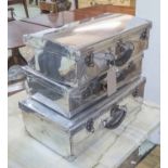 THREE POLISHED METAL FLIGHT CASES, largest 62cm x 36cm H.