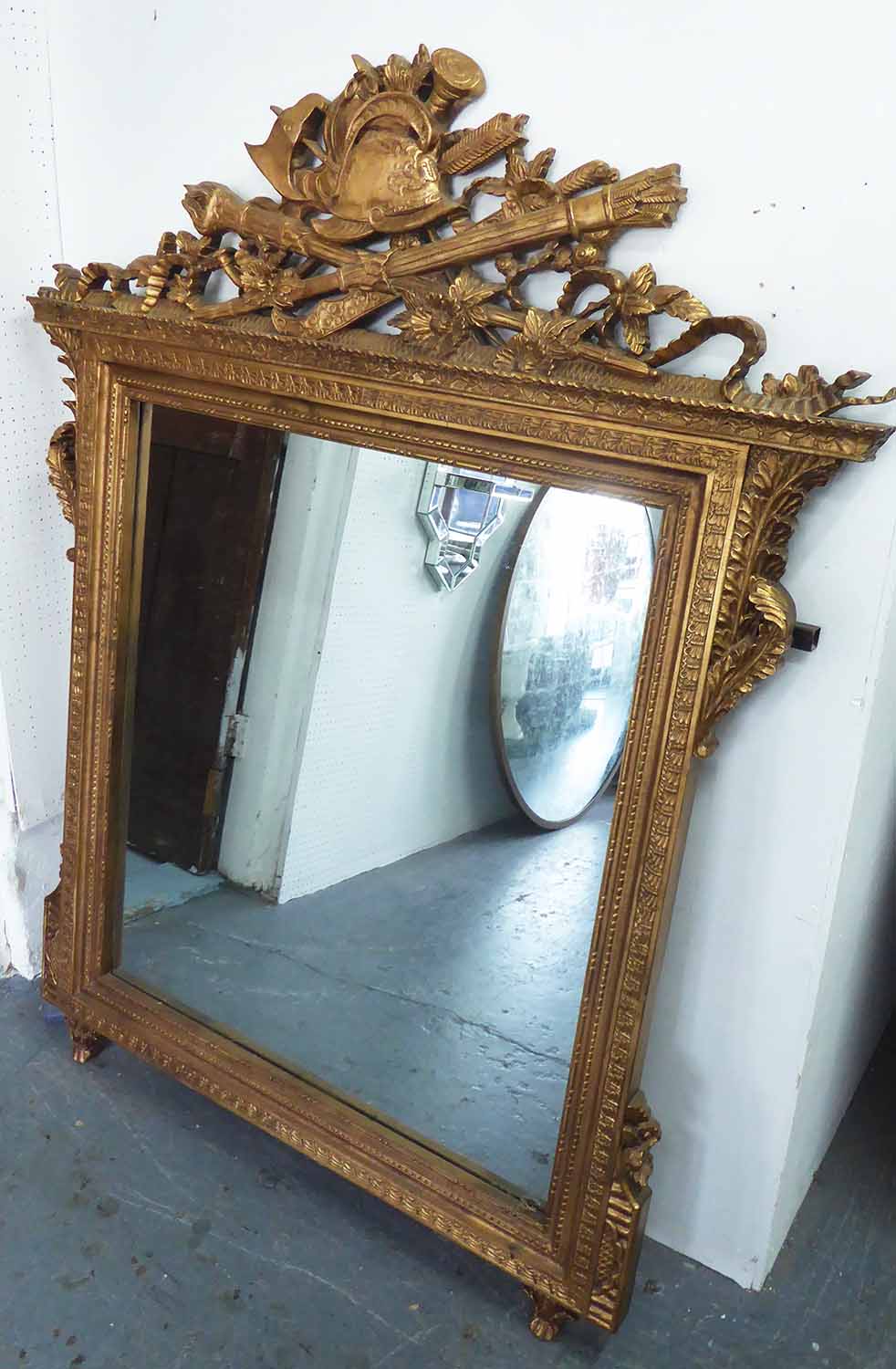 WALL MIRROR, continental style gilt with flambeau and quiver crest, 161cm x 128cm.