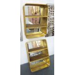 MIRRORED WALL NICHES, a pair, Bauhaus style, with gilt finish, 68cm L x 50cm W x 18cm D.