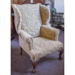 WING ARMCHAIR, early 20th century in leaf patterned chenille, 116cm H x 80cm.