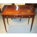 WRITING TABLE, George IV mahogany, with a three quarter galleried back and two false drawers below,