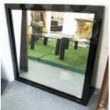 MIRROR, in a black lacquered frame, 104cm x 104cm.