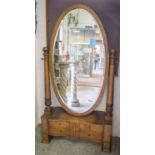 CHEVAL MIRROR, Biedermeier satin birch with oval bevelled swing plate above four drawers,