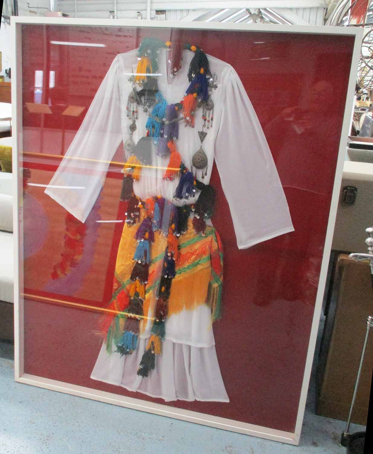 TRADITIONAL LEBANESE DRESS, framed and glazed, 170cm x 129cm.