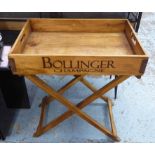BUTLERS TRAY ON STAND, adorned with famous champagne makers names, 65cm x 45cm x 80cm H.