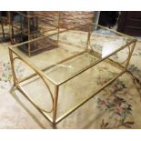LOW TABLE, rectangular gilt metal framed with a glass top, 120cm W x 46cm H x 65cm D.