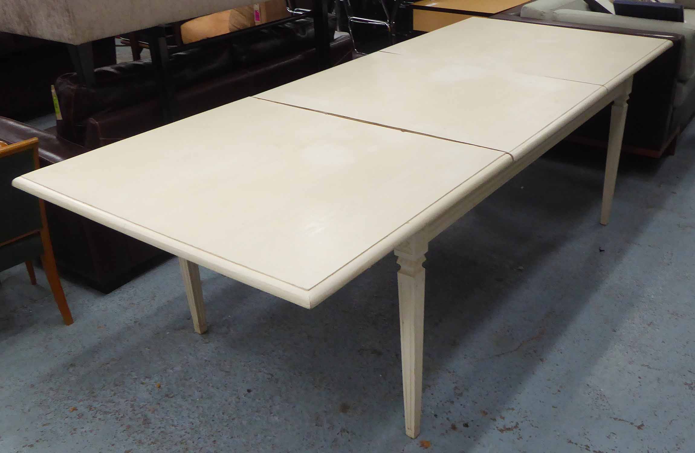 DINING TABLE, Swedish style, white painted on square supports, extending with one leaf,