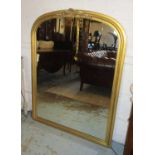 OVERMANTEL, Victorian style, gilt with an arched top, 105cm W x 138cm H.
