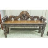 HALL BENCH, Victorian gothic, oak, the lion mask carved upstand above bolster handles, 121cm W.