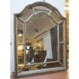 WALL MIRROR, 1920's carved wood with marginal plates, 88cm H x 69cm.