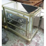 MIRRORED CHEST, of three drawers with canted corners on square supports, 92cm x 51cm x 82cm H.