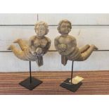 PUTTI ON STANDS, a pair, vintage Italian inspired, carved wood, 50cm H.