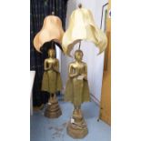 FIGURAL STANDARD LAMPS, a pair, of gilt metal deities with shaped shades, 170cm H.