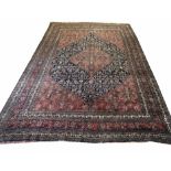 ANTIQUE PERSIAN BIJAR CARPET, 353cm x 230cm, Fereghan design of concentric herati fields,