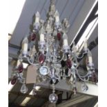 CHANDELIER, fourteen branched in a metal frame with glass drops, 121cm H plus chain.