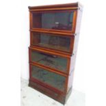 GLOBE WERNICKE BOOKCASE, early 20th century mahogany comprising four sections with base drawer,