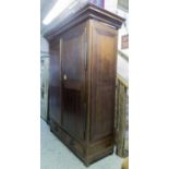 ARMOIRE, 19th century French walnut of huge proportions,