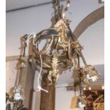 REGENCY STYLE CENTRE LIGHT, gilt metal with four peripheral lighting arms, girdle 26cm diam.