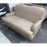 LAURA ASHLEY SOFA, two seater, howard style, in brown herringbone fabric, on turned castor supports,