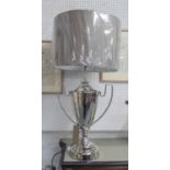 TABLE LAMP, of substantial proportions, polished metal, 90cm H.