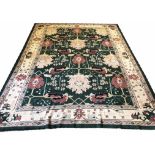 FINE DONNEGAL DESIGN CARPET, 325cm x 248cm, oversized stylised palmette and vine emerald field,