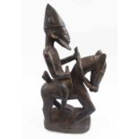 TRIBAL ARTS - DOGON CAVALIER FIGURE, carved wood, 24cm L x 51cm H.