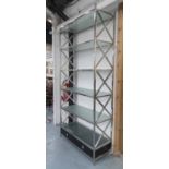 GLASS SHELVING BY EICHHOLTZ, with six shelves and two drawers below, on a chromed metal frame,