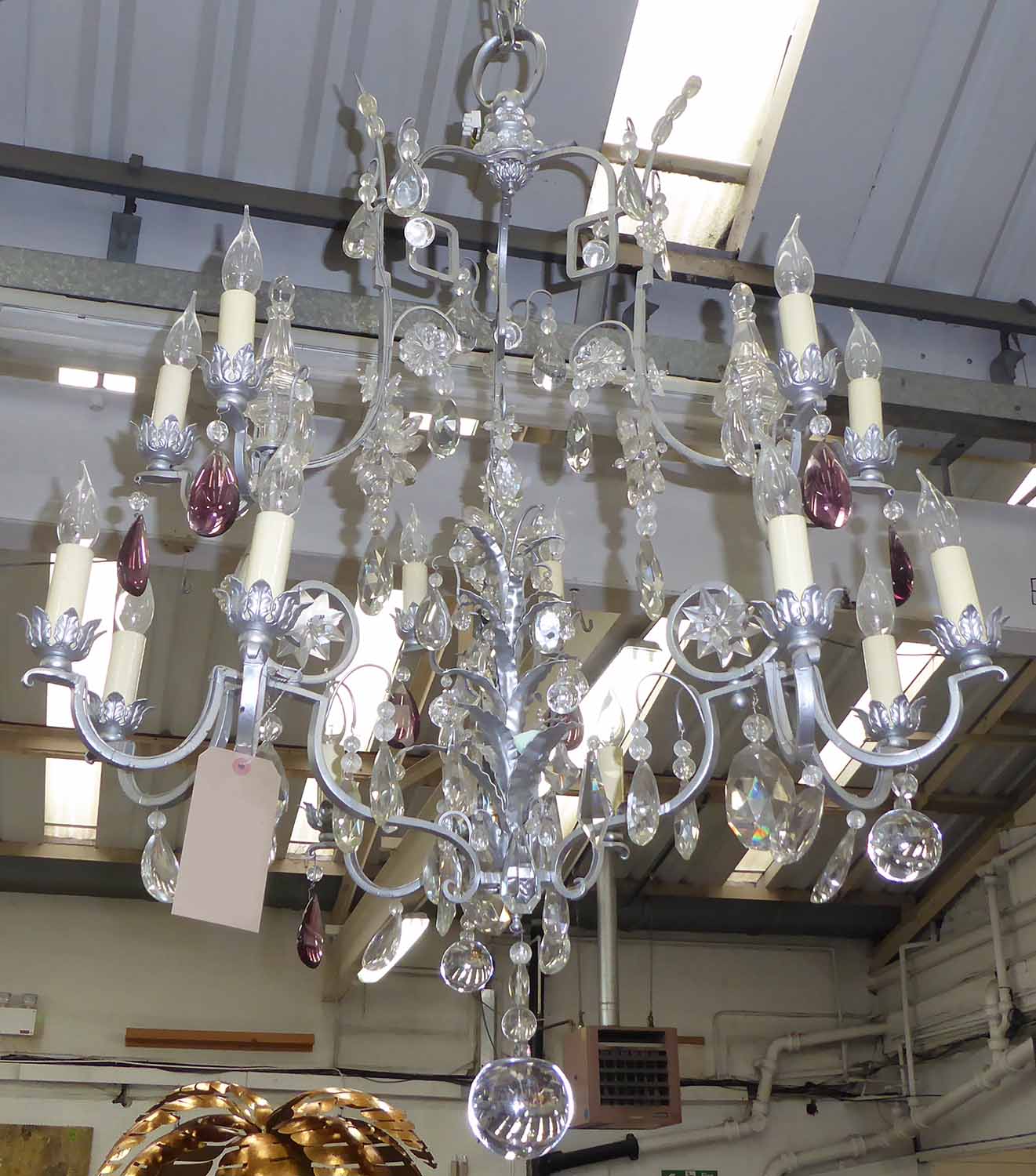 CHANDELIER, fourteen branched in a metal frame with glass drops, 121cm H plus chain.