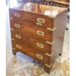 BEDSIDE CHESTS, a pair, campaign style mahogany and brass bound, each with four long drawers,