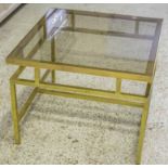 LOW TABLE, 1960's in the manner of Maison Jansen stepped brass framed with square glass insert,