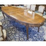 DINING TABLE, mid 20th century burr walnut with oval top,