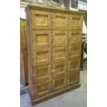 LOCKERS, Victorian pitch pine, a set of fifteen hinged panelled doors with silvered catch,