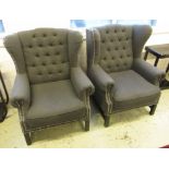 WING ARMCHAIRS, a pair, each with a buttoned back, studded decoration and grey upholstery,