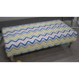 HEARTH STOOL, rectangular in chevron patterned chenille with oak feet and chrome castors,