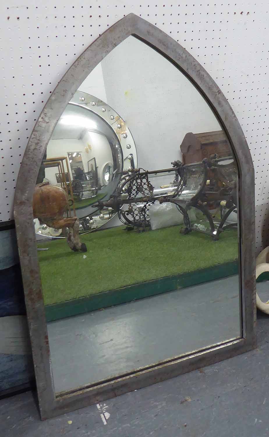 STEEL FRAMED MIRROR, of lancet shape, 90.5cm H x 60.5cm W max.