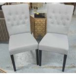 DINING CHAIRS, a set of four with buttoned backs, in light blue upholstery on ebonised legs, 44cm W.
