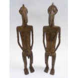 TRIBAL ARTS - GAN BRONZE FIGURAL SCULPTURES, male and female, Burkina Faso, 39.5cm H.