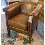 ARMCHAIRS, a pair, club form hand finished leaf brown leather each with curved back and cushion,