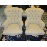 ARMCHAIRS, a pair, Victorian style, each with a buttoned back,