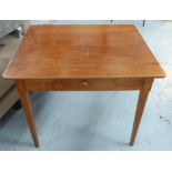 FARMHOUSE TABLE, late 19th century Continental cherrywood with a frieze drawer,