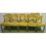 DINING CHAIRS, a set of ten Art Deco design, gilt decorated, and plush yellow velvet upholstered.