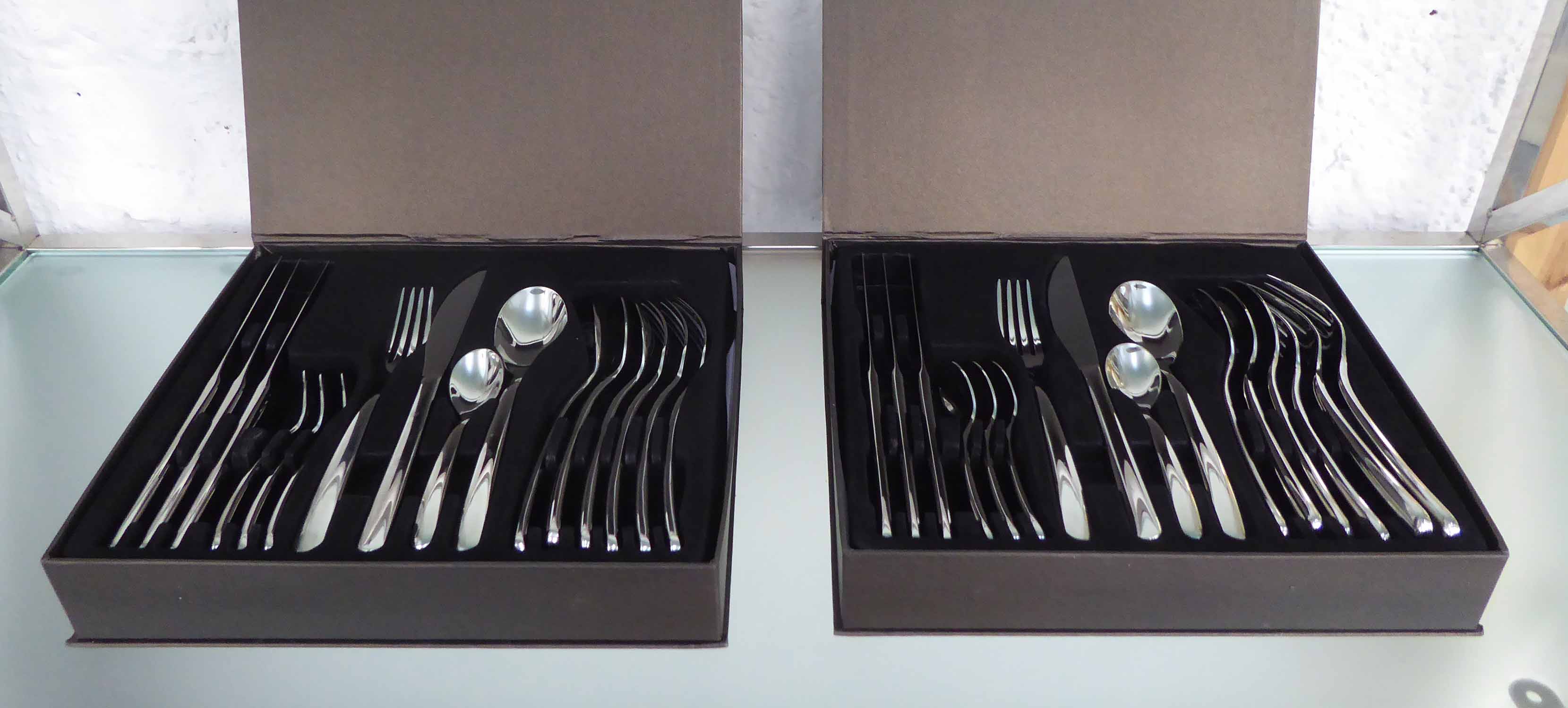 CUTLERY SETS, a pair, polished metal flatwear, boxed, 30cm x 27cm x 5cm.